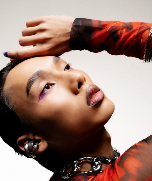 Model styled with silver jewelry